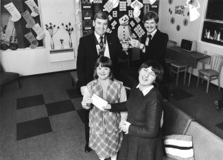 November 1981. A cheque presented to Elmbrook School, Basildon, by Ian Piddlesden to provide equipment for the new Social Education Unit.  | Echo newspaper.