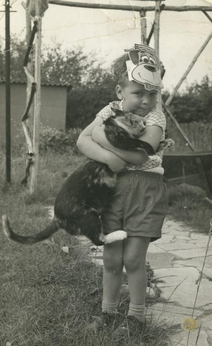 Nicholas White with Moggo, the cat.
