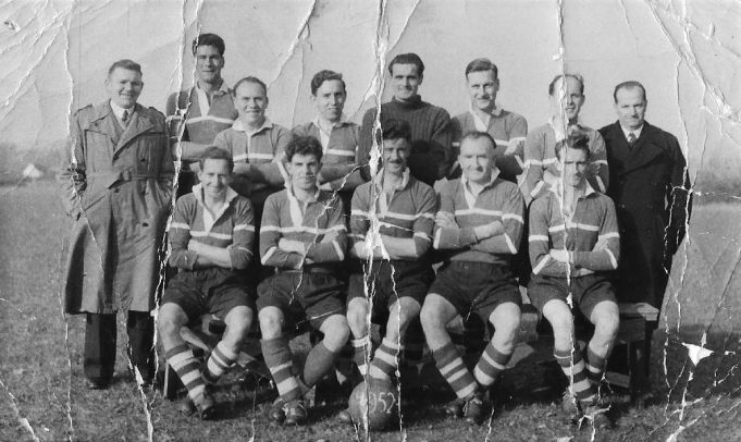 1949, Runwell Hospital Staff football team. Ken Wright is second from the right, sitting down.